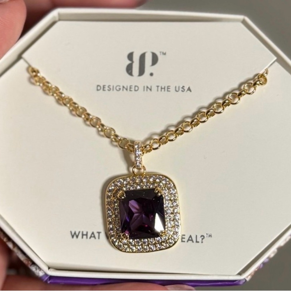 Gold Necklace with Purple Gemstone Pendant